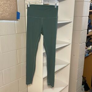 Green lululemon leggings.